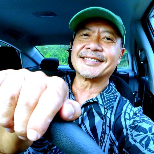 Krisada @57 yrs old: +20 yrs of Work-Anywhere-Life has been great. In 2017 I started living part time in Hawaii. This was 2023, driving to Volcano House at Kilauea Volcano, Big Island HI. Krisada Eaton driving to Volcano House, Kilauea Volcano Big Island Hawaii